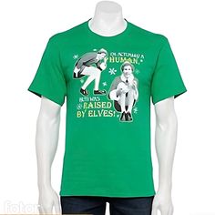 Make Your Season Extra Merry And Bright With This Men's Holiday-Themed Graphic Tee. Buddy The Elf "I'm Actually Human, But I Was Raised By Elves". Pair These With The Buddy The Elf Fleece Pants For Sale, Also In Large. See In Listings. Product Features Crewneck Short Sleeves Large Green Fabric & Care Cotton, Polyester Machine Wash Imported Band Tee Shirts, Elf Shirt, Nfl T Shirts, Mens Holiday, Character Graphic, Buddy The Elf, Elf Christmas, Christmas Characters, Fishing Shirts