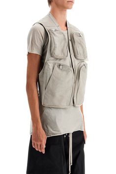 Find RICK OWENS Nappa Leather Cargo Vest For on Editorialist. Rick Owens cargo vest made of used effect leather obtained thanks to the wide processing of natural hammered leather, making each piece unique. Snap button closure and complete with cargo pockets and fully open back. The model is 187 cm tall and wears size IT 48. Outdoor Leather Vest With Pockets, Casual Leather Vest With Pockets, Cargo Vest, Leather Making, Nappa Leather, Rick Owens, Snap Button, Open Back, Luxury Fashion