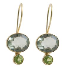 Add a touch of refined elegance to your jewelry collection with these exquisite green amethyst and peridot drop earrings. Each earring features a captivating 8x10mm green amethyst gemstone that catches the light with every movement, creating a soft, mesmerizing sparkle. Accented by a 4mm peridot at the bottom, these earrings offer a beautiful contrast between the soothing tones of green amethyst and the vibrant, lively green of peridot. The stones are set in gold-plated sterling silver, providin Elegant Green Peridot Gemstones, Elegant Peridot Birthstone Gemstones, Green Amethyst Gemstone Earrings, Elegant Faceted Green Amethyst Earrings, Elegant Peridot Birthstone Earrings, Elegant Peridot Earrings For May Birthstone, Elegant Oval Peridot Earrings, Elegant Peridot Earrings For Anniversary, Elegant Peridot Earrings For Wedding