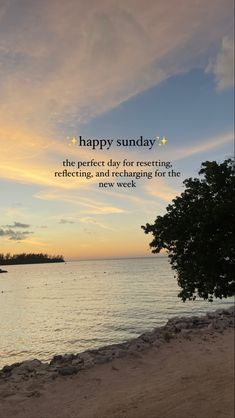 a quote on the beach saying happy sunday