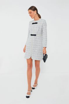 If you're anything like us, you're loving all things ladylike this season — so the Ivory Brigitta Dress is an easy yes. In a stunning tweed fabric that embodies classic elegance, this sweet and sophisticated mini features slim long sleeves for a sleek silhouette, as well as contrast trim and darling bow details. Elevate your everyday by pairing it with flats and a headband for an effortlessly refined look perfect for weekend brunches and office days, or dress it up for cocktail parties with heel Mini Tweed Dress, Elegant Spring Tweed Dress, Elegant Tweed Dress For Spring Office Wear, Elegant Cream Tweed Dress For Work, Chic Knee-length Tweed Dress For Fall, Elegant Cream Tweed Dress For Formal Occasions, Elegant White Tweed Dress For Formal Occasions, Elegant White Tweed Formal Dress, Elegant Cream Tweed Dress For Spring