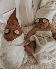 two babies with cucumbers on their eyes are wrapped up in towels and towel