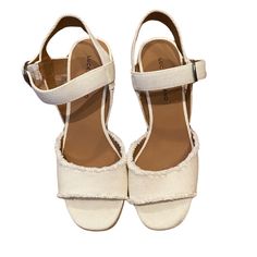 Visit The Lucky Brand Store 4.5 3,606 Lucky Brand Women's Mindra Espadrille Wedge Sandal, 7.5, Ivory, Never Worn Casual White Wedge Sandals With Heel Strap, Spring Cream Wedge Sandals With Block Heel, Cream Block Heel Wedge Sandals For Spring, White Platform Espadrilles With Ankle Strap, White Open Toe Synthetic Espadrilles, Casual White Heels With Heel Loop, White Platform Espadrilles With Wedge Heel, Casual White Wedge Heel Espadrilles, Cream Wedge Sandals With Heel Strap And Round Toe