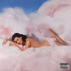 a woman laying on top of a cloud covered in pink clouds with her legs spread out