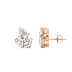 You won't regret treating yourself to this fuss-free wardrobe staple. These diamond cluster earrings will easily fit in with many different looks. Each earring features three diamonds set close to each other: two of which are pear-shaped and set in opposite directions, and one oval-shaped secured by four prongs. Luxury Diamond Cluster Earrings With Sparkling Stones, Timeless Luxury Cluster Earrings With Diamond Accents, Luxury Elegant Diamond Cut Cluster Earrings, Luxury Elegant Lab-grown Diamond Cluster Earrings, Luxury Classic Yellow Gold Cluster Earrings, Luxury Classic Cluster Earrings With Pave Setting, Luxury Cluster Earrings With Prong Setting, Cluster Stud Earrings, Pear Earrings