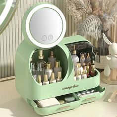 A cosmetic Organizer with Fan and 360° Rotating LED Mirror is your best choice with its high capacity, you can fit all of your favorite cosmetics in this organizer. The mirror surface is rotatable and flexible.LED makeup mirror with fan, surrounded by the breeze, to avoid sweating and make your makeup more smoothly. USB charge powered makes sure it can be used anywhere. Jewelry And Makeup Organizer, Makeup Vanity Green, Cute Desk Mirror, Vanity Skincare Organization, Cute Room Things, Organization Ideas For Bedroom, Temu Items, Makeup Organizer With Mirror, Makeup Box Organizer