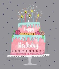 a birthday cake with pink frosting and sparklers on top, sitting on a polka dot tablecloth