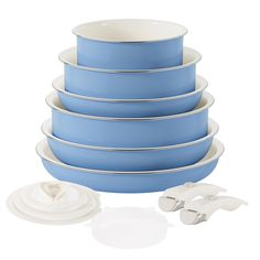 a stack of blue and white dishes next to each other