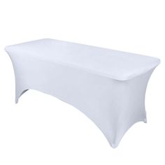 a white table cloth on top of a long table