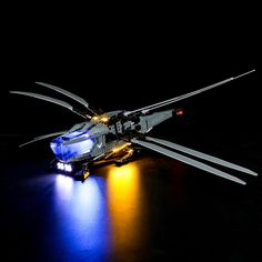 the helicopter is lit up and ready to be used as a propellor carrier