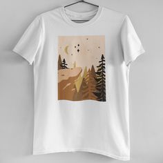 Overlook Clay Mountain Edge Crescent Tee Brand New! Our In House T-Shirts Are High Quality And Printed On Demand. This Tee Features White 100% Cotton, Relaxed Boyfriend Fit, And Print Of Neutral Toned Mountainous Overlook At Dusk With Crescent Moon And Stars. Size S-Xl Available (Model Is Wearing A Size M) Search Tags: Dusk Summer Natural Desert Boho Bohemian Vintage Retro Aesthetic Natural Art Clay Mountain, Dusk Summer, Vintage Retro Aesthetic, Fall Tee Shirts, Desert Boho, Aesthetic Natural, Band Tee Shirts, Maroon Shorts, Red Boho