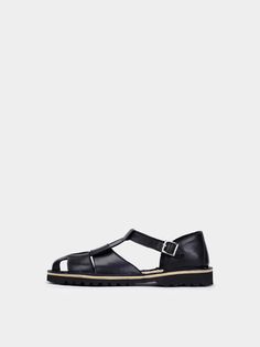 Editor's NotesTONNO22's shoes are trendy and perfect for daily wear.- Light-weighted- Eye-catching webbing leather style- Adjustable ankle strap with buckle- Comfortable lining- Casual and minimal styleMeasurements(in.)- Size: KR 225MM (US 5.5) ~ KR 255MM (US 8.5)- Heel: 1.2in. (+0.39in. inner heel)*Fits true to size.Composition & Care- Upper: Cow leather- Sole: rubber- Avoid direct heat and moisture- Professional cleaning is recommendedDesigner- by TONNO22 Closed Toe Calf Leather Sandals With Tang Buckle, Leather Monk Strap Shoes With Flat Heel, Summer Leather Monk Strap Shoes With Round Toe, Spring Leather Monk Strap Shoes With Leather Sole, Spring Leather Monk Strap Shoes With Rubber Sole, Modern Leather Sandals With Tang Buckle, Classic Ankle Strap Sandals With Rubber Sole, Casual Leather Monk Strap Shoes With Buckle Closure, Modern Sandals With Leather Lining And Round Toe