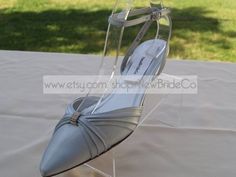 Amazing Classic Closed toes Shoes. This shoe is the cutest lowest heel wedding shoes: Heels: 1 1/4'' For super comfort! For Brides who prefer closed toes! Colors Available: For this listing: White, Ivory, and Off-white $99.00 Any other color $115.00 Champagne, Silver, Red, Royal Blue or, Custom colors $118.00 Please contact before, or after you order your shoes, you may order color swatches, or send me your swatch color sample. US Sizes: B5, 5.5, 6, 6.5, 7, 7.5, 8, 8.5, 9, 9.5, 10, 11. TO ORDER Silver Pointed Toe Kitten Heels For Wedding, Silver Leather Kitten Heels Low Heel, Silver Court Shoes With 4-inch Heel For Wedding, Silver Wedding Court Shoes With 4-inch Heel, Silver Kitten Heels With 4-inch Heel For Party, Silver Kitten Heels, Wedges Shoes Low, Silver Kitten Heels With 4-inch Heel, Wedding Shoes Low Heel