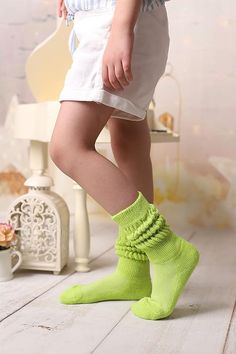 Keep your child warm and stylish with these Kids Cotton Knee High Slouch Socks, designed for ages 3-15. Made from a breathable blend of 85% cotton, 13% polyamide, and 2% elastane, these socks offer the perfect balance of comfort and elasticity. The slouch design allows them to be worn pulled down around the ankle as scrunch socks or stretched up to protect the calves, making them versatile for any outfit. Ideal for autumn and winter, these skin-friendly socks provide warmth without being too bul Scrunch Socks, Socks Knee High, Slouch Socks, Multiple Outfits, Boys Socks, Cool Gifts For Kids, Long Socks, Calf Socks, Girls Socks