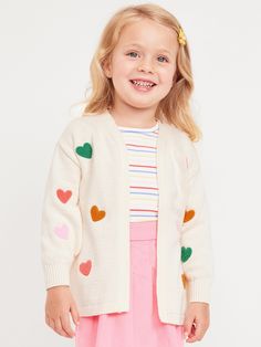 v neck open front long puffy sleeves all-over print or patch applique loose fit hits below waistmachine wash according to the care instruction label Multicolor Cotton V-neck Cardigan, Multicolor V-neck Cotton Cardigan, Long Sleeve Spring Sweater For School, Playful White Long Sleeve Outerwear, Playful Multicolor Long Sleeve Cardigan, Cute Spring Cardigan For School, Cute Multicolor Long Sleeve Cardigan, Cute Long Sleeve Spring Cardigan, Cute White V-neck Outerwear