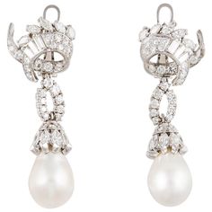 Platinum South Sea pearl and diamond drop earrings. The two South Sea pearls measure 11.5mm. There are round, marquise and baguette diamonds that total 5.50 carats; G-I color and VVS-SI clarity. Measure 1 7/8 inches long and 3/4 inches wide. They are for pierced ears with a lever back. Pearl Diamond Dangle Earrings, Diamond And Pearl Earrings, Diamond Pearl Earrings, Square Diamond Earrings, South Sea Pearls Earrings, Enchanted Jewelry, Diamond Cluster Earrings, Platinum Earrings, Earrings For Sale