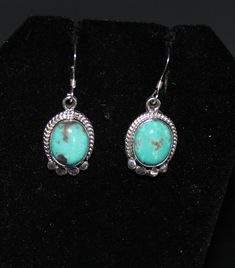 Kingman Turquoise and Sterling Silver Earrings measure 1/2" long and 3/8" wide with a total drop length of 1 1/8" Turquoise Long Drop Earrings With Ear Wire, Southwestern Green Teardrop Earrings, Bohemian Turquoise Oval Earrings, Turquoise Sterling Silver Long Drop Earrings, Turquoise Long Drop Sterling Silver Earrings, Turquoise Teardrop Jewelry Set, Turquoise Teardrop Jewelry With Matching Earrings, Handmade Oval Turquoise Earrings, Southwestern Turquoise Jewelry With Ear Wire