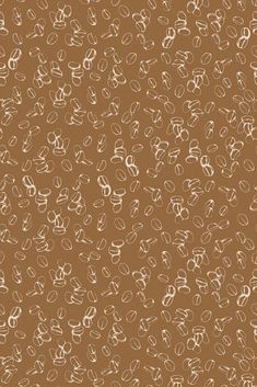 a brown and white background with small circles