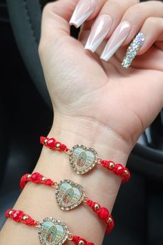 This handmade bracelet makes a beautiful addition to daily adorations, whether it’s for your own spiritual journey, or for someone you love. ❤️ Solid Red, Rhinestone Heart, Gold Rhinestone, Virgin Mary