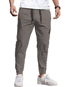 PRICES MAY VARY. Cotton Fabric --- These men's casual cargo pants are made of breathable, high-quality, lightweight, soft micro-elastic fabric, which can provide you with comfort during exercise and a skin-friendly feel in daily wear. Casual Design --- The cotton hiking pants have a high-quality adjustable fit, 2 pockets on the front and back for carrying some belongings, and three-dimensional leather fashion logos on the front and back to add a sense of style. Multiple Occasions --- The cotton Casual Breathable Cargo Pants For Outdoor Activities, Breathable Casual Cargo Pants For Outdoor, Breathable Casual Cargo Pants For Outdoor Activities, Outdoor Cotton Cargo Joggers, Gray Cotton Cargo Pants For Outdoor, Casual Breathable Gray Bottoms, Casual Gray Breathable Bottoms, Cotton Joggers With Side Pockets For Outdoor, Gray Breathable Cotton Bottoms