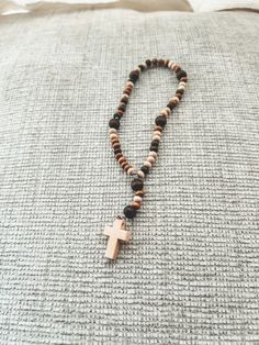 Multi-colored wooden beads make up this perfect mini rosary. **Note: each rosary is hand-made by order and may differ from image shown. Wooden Rosary, Mini Rosaries, Prayer Beads, How To Make Beads, Wooden Beads, Rosary, Multi Colored, Hand Made, Shopping Outfit