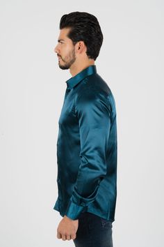 Fabric: Satin Fit: Relaxed fit About: This solid-colored satin dress shirt from Platini Jeans will enhance your fashionable wardrobe. The head-turning color adds flair to the classic long sleeve shirt. A relaxed fit delivers sleek style, and the point collar provides a modern finishing touch. Details & Features: Satin Point Collar Long sleeve Button closure Modern Fit Machine Washable Classic style Elegant Spring Party Dress Shirt, Fitted Long Sleeve Dress Shirt For Party, Fitted Long Sleeve Party Dress Shirt, Elegant Slim Fit Dress Shirt For Party, Slim Fit Long Sleeve Dress Shirt For Party, Elegant Button-up Dress Shirt For Party, Elegant Slim Fit Party Dress Shirt, Fitted Shirt With Spread Collar For Party, Semi-formal Fitted Satin Shirt