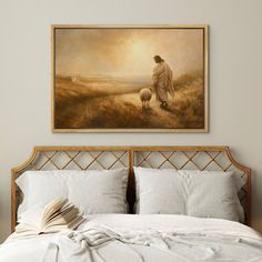 a painting on the wall above a bed in a room with white sheets and pillows