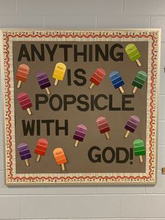 a sign that says anything is popsicle with god in front of some ice cream cones