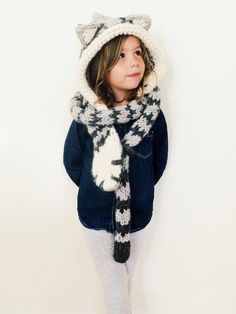 This whimsical hooded scarf is the perfect mix of cozy and cute. Available in three sizes, it brings warmth and a playful energy to any age from tiny tot to adult -  download the pattern from LoveCrochet! Lion Hat, Hood Pattern, Hooded Cowl, Cowl Dress, Scarf Knit, Crochet Knit Hat, Crochet Goodies, Hooded Scarf, Cowl Scarf