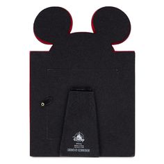 the mickey mouse head has been made out of black felt and is attached to a clipboard