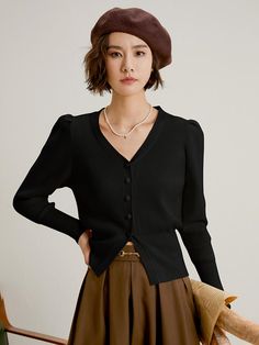 This is a feminine and romantic cardigan by LANGSON that is made out of high quality cotton wool, nylon, acrylic, and mohair blend fabric. With design detail of thick ribbing on cuffs and hem and high quality buttons on the front, it gives a trendy and feminine look.- Thick ribbed hem and cuffs for feminine silhouette- Front button closure- Feminine and modern mood Chic Winter Cardigan With Button Cuffs, Classic Black Knit Cardigan, Black Formal Winter Sweater, Fitted Elegant Cardigan With Buttons, Black Sweater With Button Cuffs For Winter, Elegant Fitted Cardigan With Buttons, Black Winter Sweater With Button Cuffs, Chic Black Sweater With Button Cuffs, Black Sweater With Button Cuffs For Fall