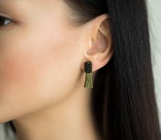 Small green tassel earrings Minimalist tassel earrings Olive green earrings Short tassel earrings Tiny tassel earrings Green drop earrings These tiny tassel earrings are perfect for those who like minimalist earrings. They are perfect for everyday and special occasions. These earrings are the perfect gift for a loved one ❤ Jewellery care instructions: it is recommended to protect earrings from direct contact with cosmetics, perfumes and shampoos, and to avoid swimming or bathing with the beaded Green Tassel Earrings, Beaded Tassel Earrings, Jewelry Care Instructions, Lightweight Earrings, Earrings Minimalist, Green Earrings, Beaded Tassels, Light Weight Earrings, Fringe Earrings