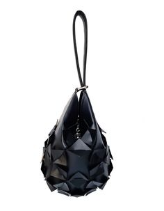 Accessories can make or break an outfit and none speak louder than a bold statement bag. Due to its timeless shape, this bucket bag can be worn effortlessly throughout the year. Carry it on the wrist or hold it for a contemporary take on evening dressing. Our Star Bucket bag is like a precious ornament that will add a luxury and edgy touch to your every look. She's crafted from quality vegan leather to a water-drop silhouette. It's signature three-dimensional geometric surface is punctuated by s Trendy Top Handle Bucket Bag For Party, Party Bucket Bag With Adjustable Strap, Chic Party Bucket Bag With Detachable Strap, Black Bags With Detachable Handle For Fashion, Trendy Leather Bucket Bag For Party, Black Bucket Bag For Party, Chic Pouch Bucket Bag For Party, Chic Bucket Shoulder Bag For Party, Black Shoulder Bucket Bag For Party