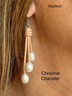 "This is a classic pair of pearl and leather dangling earrings that can be worn with anything.  There is a choice of 2 styles \"A-Frame\" or \"Stacked\".  There are 3 white freshwater rice style 10mm pearls on each earring.  The earrings dangle 2.5 inches.  You can order in any leather color.  Sterling Silver ear wires." Elegant White Leather Jewelry, Classic Leather Jewelry, Long Drop Pearl Earrings For Everyday, Leather Teardrop Jewelry, Everyday Long Drop Pearl Earrings, Elegant Teardrop Leather Jewelry, Elegant Leather Jewelry For Everyday, Elegant Leather Earrings With Ear Wire, White Leather Earrings For Gift