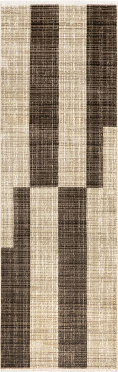 a brown and white rug with squares on the bottom, in shades of beige and brown