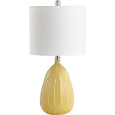 a yellow table lamp with a white shade