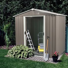 a garden shed with the door open and tools in it next to some potted plants