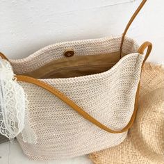 Carry Summer Wherever You Go Introducing our Bohemian Straw Woven Shoulder Bag, your new favorite summer accessory that combines effortless style with functional design. Perfect for beach getaways, sunny market days, or any casual outing, this handcrafted bag is as versatile as it is beautiful, ensuring you carry a piece of summer with you wherever you go. Key Features High-Quality Straw Material: Meticulously woven from the finest straw, this bag offers durability while staying lightweight, making it ideal for all-day wear. Compact Yet Spacious: With dimensions of 25*25*12 cm, it provides ample space for your essentials without being bulky. Secure Hasp Closure: Keeps your belongings safe with an easy-to-use hasp closure that adds an elegant touch to the bag's overall design. Benefits of O Sand-colored Shoulder Bag For Summer Travel, Chic Summer Beach Canvas Bag, Summer Everyday Canvas Bag With Adjustable Strap, Rectangular Canvas Bag For Summer Vacation, Trendy Beige Shoulder Bag For Vacation, Trendy Handwoven Beige Bucket Bag, Casual Handwoven Shoulder Bag For Everyday Use, Trendy Beige Bags In Natural Fiber, Summer Style Sand-colored Shoulder Bag