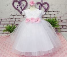 EMMA, white with pink, 3-piece, dress + headband + shoes We have shoes in sizes 10 cm, 11 cm, 12 cm, 13 cm - A wonderful pretty dress for your little princess + headband - All crafted with love and care, stunning and graceful - Condition: New - Material: 100% polyester decorated with an elegant bow **Available sizes - Size 56 - Size 62 - Size 68 - Size 74 - Size 80 - Size 86 - Size 92 - Size 98 - If you need a different size, just write to us - Please specify size **Please note - Sizes: +/-2cm t Fitted Princess Dress For Baptism In Spring, Fitted Princess Dress For Summer Baptism, Summer Princess Dress For First Communion, Summer First Communion Fitted Princess Dress, White Spring Tutu Dress For Confirmation, White Tutu Dress For Confirmation In Spring, White Tutu Dress For Spring Confirmation, White Fitted Tutu Dress For Wedding, Princess Style Baptism Dress For First Communion In Spring