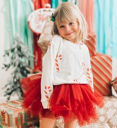 Visit Santa in this cozy candy cane sweatshirt. Perfect to pair with leggings + a Santa hat for this years holiday pics! Preshrunk. Runs Large Made in USA Iloveplum Tutu, Toddler Girl Christmas Outfits, Pop Christmas, Girls Holiday Outfit, Toddler Christmas Outfit, Holiday Pics, Embroidery Clothes, Xmas Outfit, Christmas Tutu