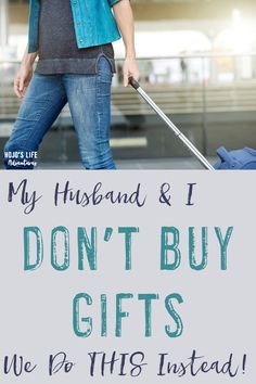 a woman walking with her luggage and the words, my husband & i don't buy gifts we do this instead