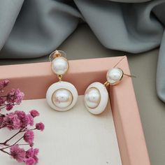 Handmade Stud Pearl Earrings, Bridesmaid Gifts, Anniversary Gift, Wedding jewelry, Pearl Jewelry, Western Jewelry, Earrings for Western Outfit, Gift for Her, boho - hippi style, Best gift for women, Girls, Daily wear Earrings Our earrings are so unique and impressive! Made from real freshwater pearls. Perfect for bridal earrings, bridesmaid earrings or for everyday wear. Since all the pearls used are original and unique, their shapes may differ. ★ CUSTOMER SATISFACTION ★ *Do not hesitate to contact me anytime before and after your purchase, I am committed to your 100% customer satisfaction.  *My main goal is to make sure you are a happy customer and pleasant shopping with me. *Your 5 Star feedback is very appreciated. You can 24x7 contact me for any kind of help or concern.  *Please contac White Round Bridal Earrings For Party, White Round Pearl Earrings For Party, Pearl White Round Bridal Earrings For Party, Pearl White Round Earrings For Party, Handmade Round Pearl Earrings For Party, White Pearl Drop Earrings For Party, Jewelry Western, Western Outfit, Gifts Anniversary