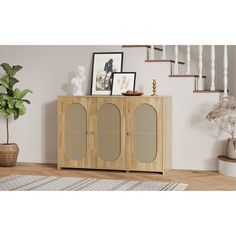 the sideboard is made out of wood and has wicker panels on it's sides