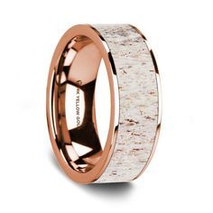 the rose gold wedding band with an antelope inlay and white marble inside