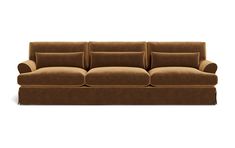 a brown couch sitting on top of a white floor