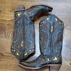 Gorgeous Corral Vintage Butterfly Cowboy Boots Black With Blue, Yellow And Red Accents. Size 6 Nwt But No Box Full-Grain Leather 13" Shaft Snip Toe Leather Lining Cushioned Footbed Double Rose Scallop Butterfly Glitter Inlay Shaft Embroidery Leather Outsole 2" Western Heel Style: A1920 Western Boots With Leather Sole For Festival, Western Style Boots With Leather Sole For Festivals, Black Ankle Boots For Ranch, Black Ankle Boots For Festival, Western Black Boots For Country Events, Black Western Boots For Country Events, Leather Country Boots For Festival, Country Style Leather Boots For Festivals, Black Snip Toe Country Boots