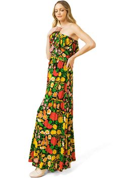 Beautiful full length maxi dress featuring bright summer floral prints and a one-shoulder neckline and ruffle overlay. Stretchy elastic band across the top and at the waist complete with a self-tie belt. CARE | Hand Wash Cold CONTENTS | Self: 100% Rayon/Lining: 100% Polyester MEASUREMENTS | 56"/142 cm Top to Bottom (Size Small) MODEL | 5'8 - wearing a size Small IMPORTED Strapless Green Floral Print Maxi Dress, Strapless Summer Maxi Dress With Floral Print, Strapless Floral Print Summer Maxi Dress, Green Floral Print One Shoulder Maxi Dress, Strapless Multicolor Maxi Dress For Garden Party, Summer One-shoulder Maxi Dress With Floral Print, Summer Floral, Black Maxi Dress, Tie Belt