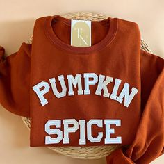 Cozy up with our Pumpkin Spice Crewneck Sweatshirt this fall season! It is also a great gift to your loved ones who loves fall season! - Sweatshirt is super soft and comfy! ♡ - Sweatshirt composition: 50% cotton, 50% polyester - All our sweatshirts run a unisex fit. They are naturally oversized, so we normally recommend your true size. But if you like a more baggy look, we recommend sizing up. - These letters are iron-on patched and is heat pressed, not embroidered. But rest assured they've been Fall Loungewear T-shirt, Diy Fall Sweatshirts, Fall Cotton T-shirt With Ribbed Cuffs, College Letter Print T-shirt For Fall, Casual Fleece T-shirt For Fall, Varsity Tops For Fall, Varsity Style Relaxed Fit Top For Fall, Varsity Tops With Ribbed Cuffs For Fall, Fall T-shirt With Ribbed Cuffs And Relaxed Fit