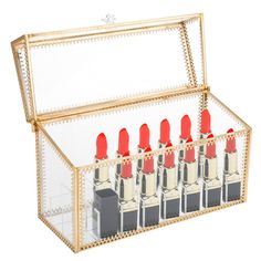 a set of six lipsticks in a clear box