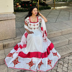 Make a bold and unforgettable statement with our "Ravishing in Red" Habesha Dress, a stunning ensemble that seamlessly combines tradition and contemporary elegance. This gorgeous habesha kemis is handwoven with precision and adorned with intricate embroidery, showcasing the artistry and craftsmanship rooted in Ethiopian heritage. Habesha Dress, Ethiopian Dress, Habesha Kemis, Wedding Dress Chiffon, Cultural Celebration, Dresses Chiffon, Wedding Dresses Simple, Vibrant Red, Simple Dresses